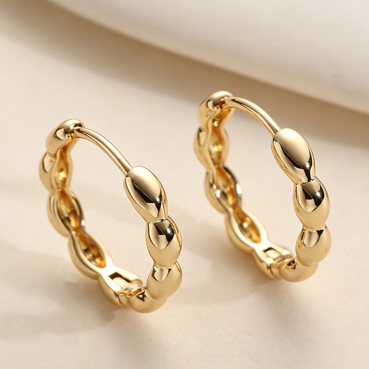 Mira Twist Hoop Earrings